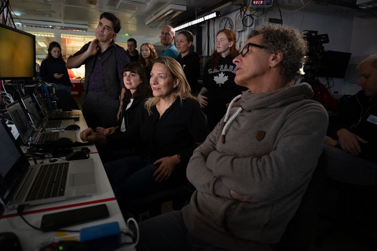 Antje Boetius (center), Director of the AWI, looks with the expedition crew at images of the seabed filmed and photographed by OFOBS (Ocean Floor Observation and Bathymetry System). OFOBS is towed over the bottom and records photos and videos. 