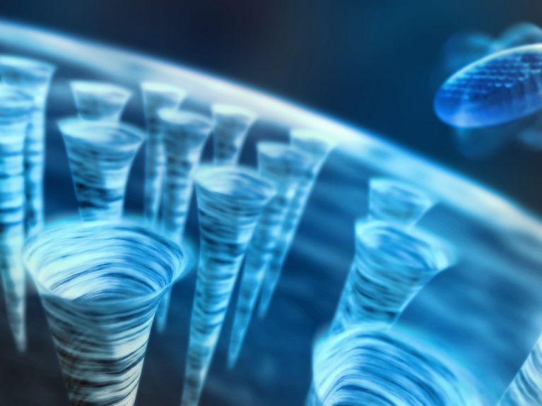 Quantenstrudel in Nanotröpfchen Künstlerische Darstellung des Gitters aus Quantenstrudeln in einem supraflüssigen Tropfen.